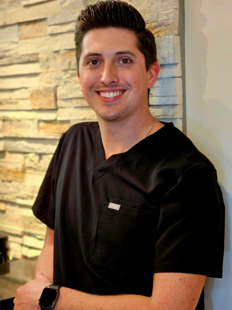 Professional headshot of Dr. Brandon Kratz, experienced dentist at Creve Coeur Family & Sedation Dentistry.