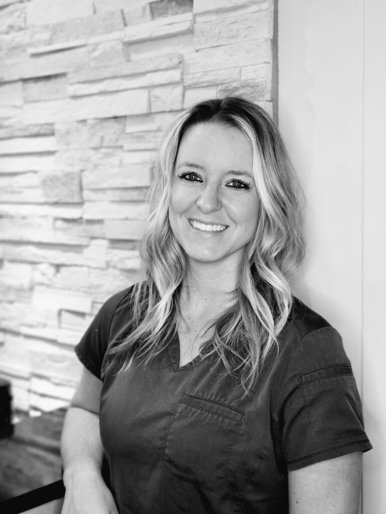 Meet the team photo of Dana, showcasing her expertise as an expanded functions certified dental assistant.