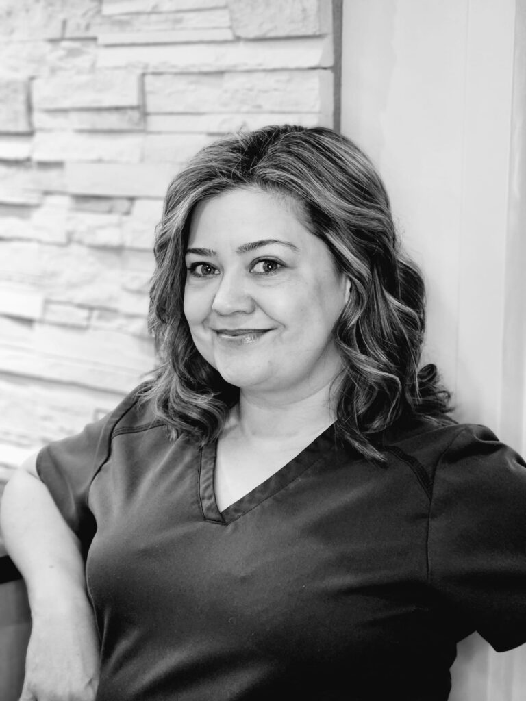 Meet the team photo of Monica, front office coordinator, welcoming patients at Creve Coeur Family Dentistry.