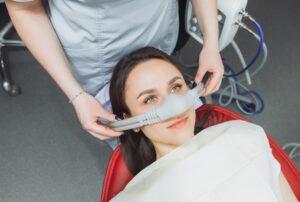 Female patient receiving nitrous oxide sedation at Creve Coeur Family & Sedation Dentistry for a calm and anxiety-free dental experience